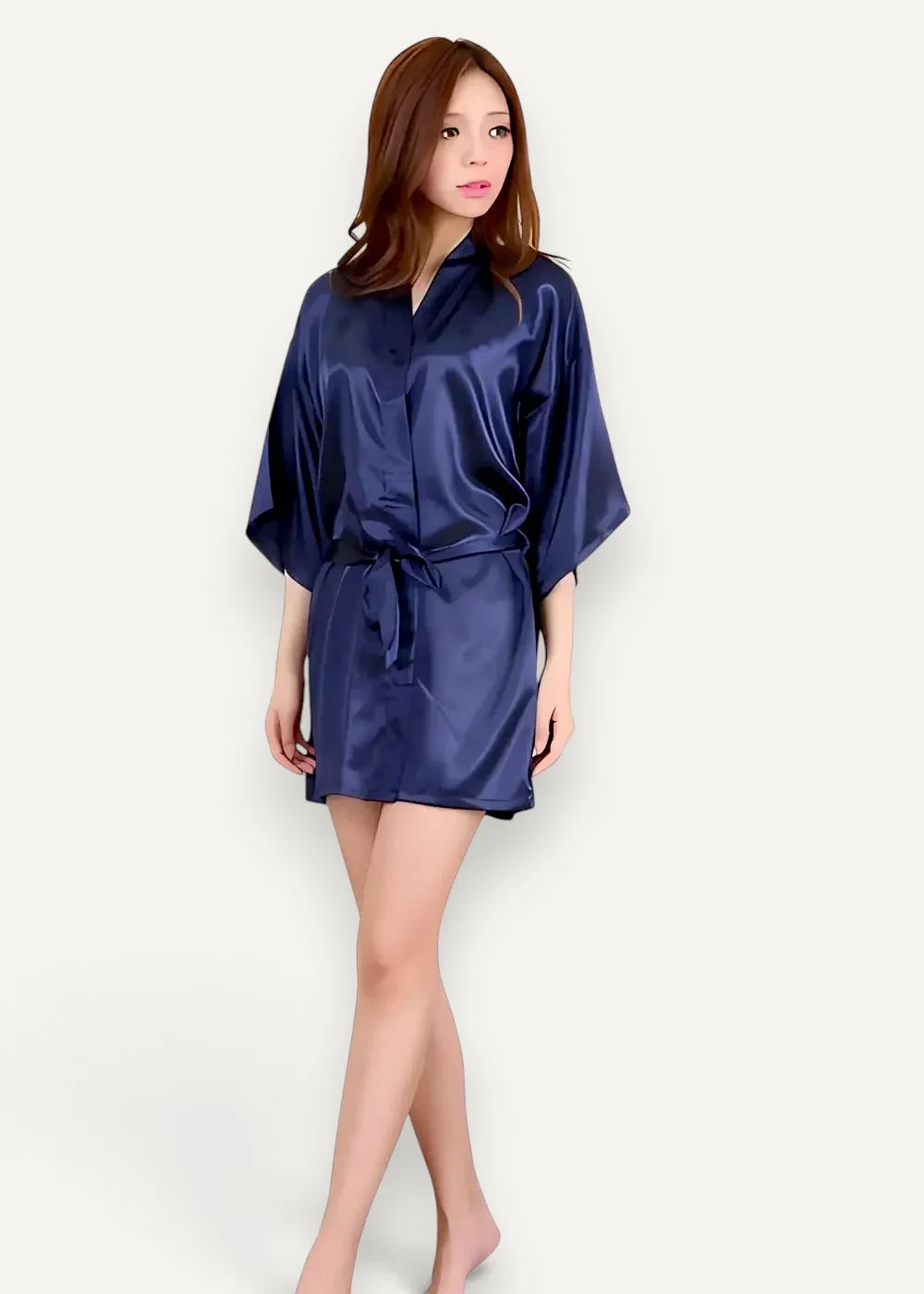A navy blue satin robe for women featuring a tie belt and wide flowing sleeves for elegant comfort