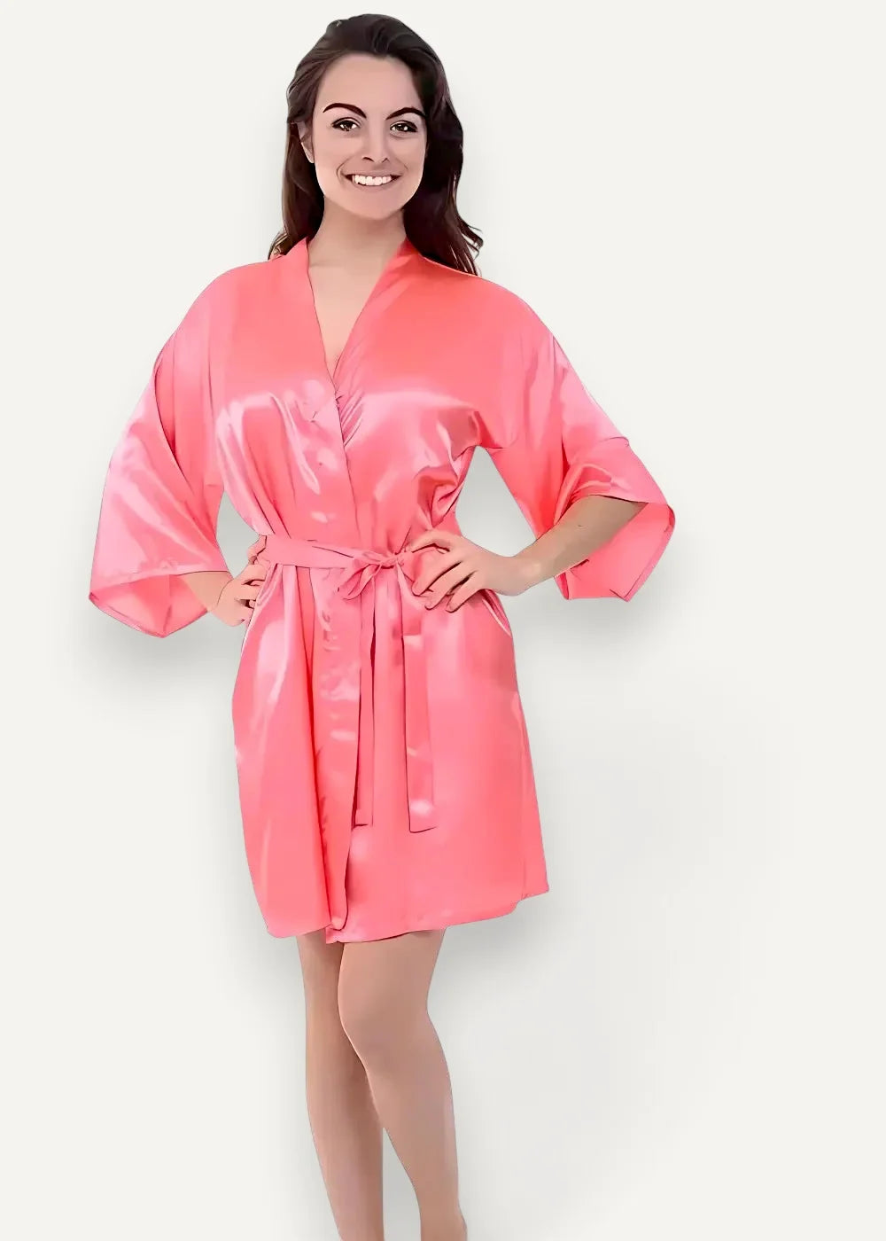 A vibrant coral satin robe for women with v-neckline three-quarter sleeves and a self-tie belt