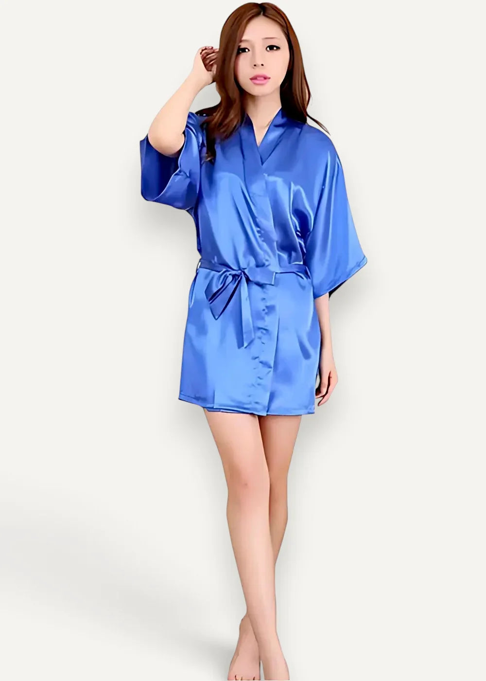 A vibrant royal blue satin robe for women with v-neckline three-quarter sleeves and a matching self-tie belt