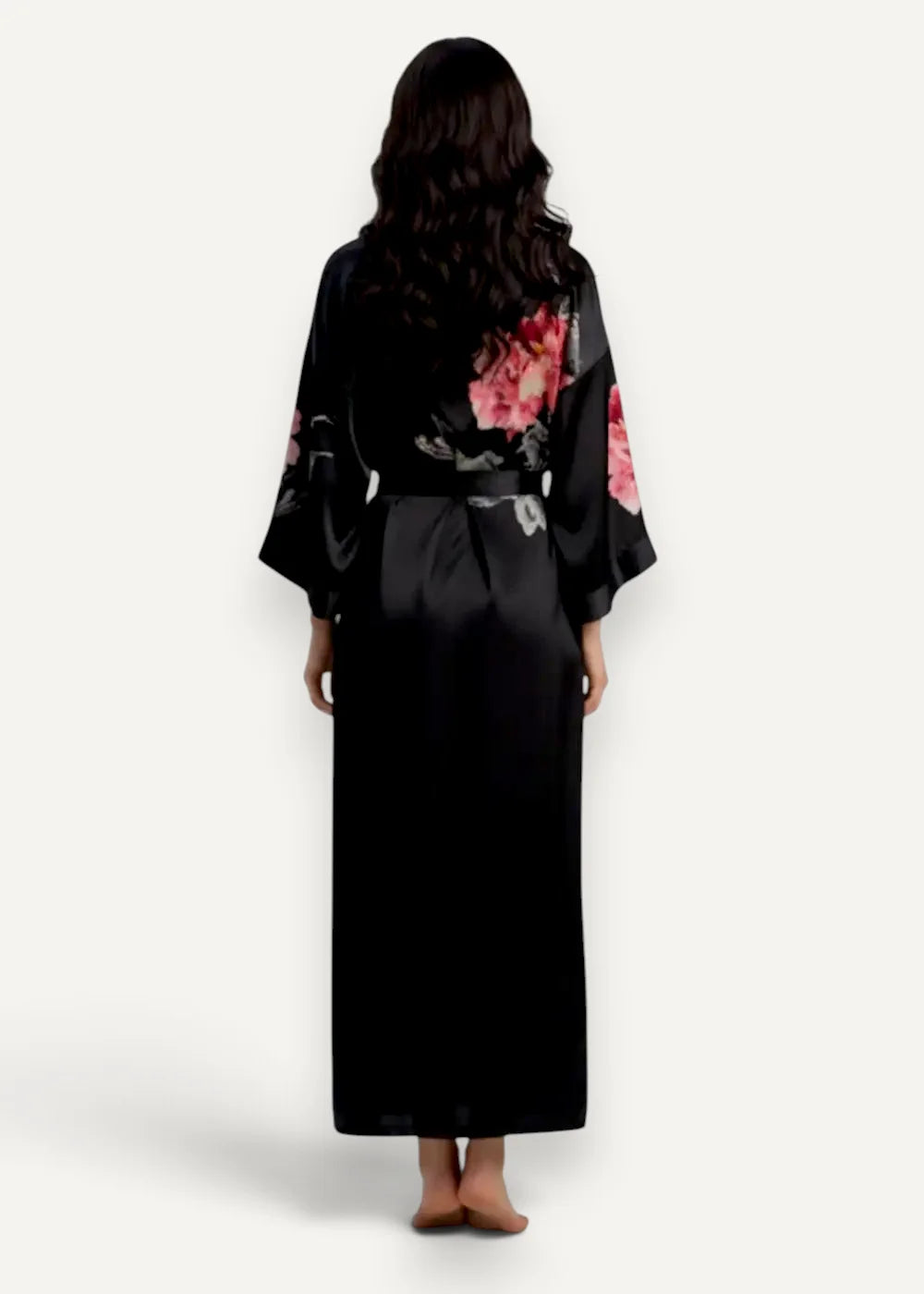 Black satin robe lingerie showing back with vibrant pink and white floral embroidery on back and sleeves