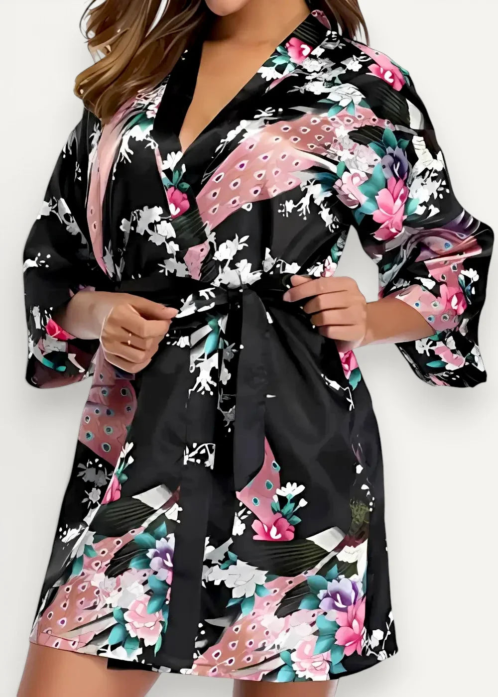 Short black satin robe with vibrant pink white and teal floral and peacock feather patterns