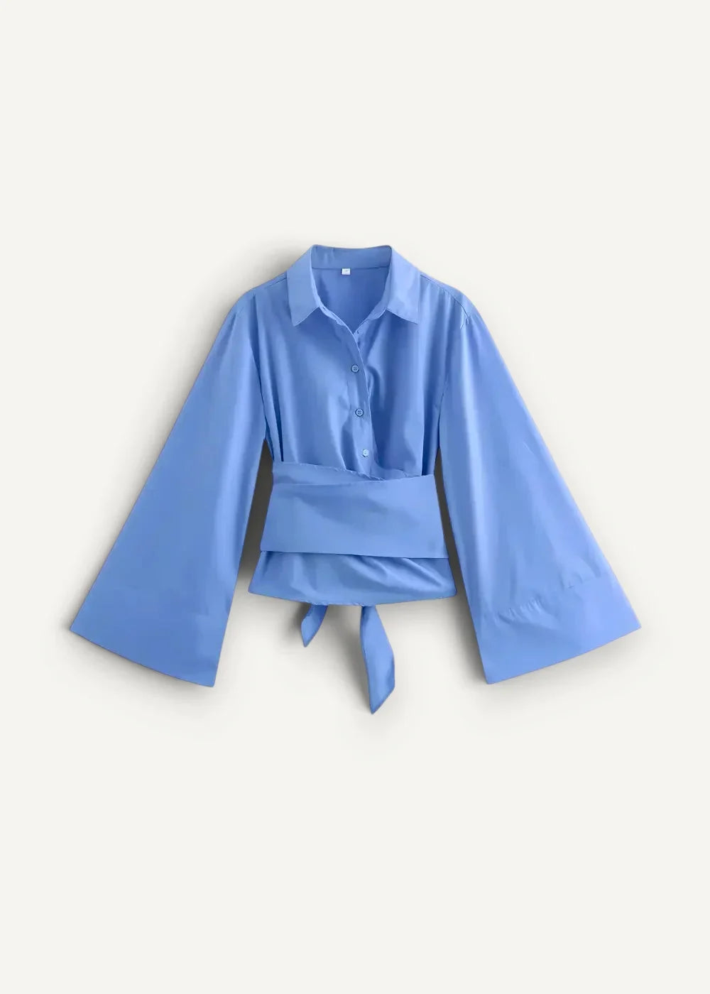 A light blue short kimono cover up blouse with button down front flared sleeves and waist tie detail