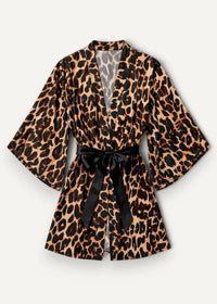 Short kimono robe in leopard-print satin with a black silk sash tied in a bow at the waist