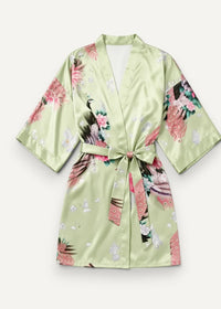 Light green short satin robe with floral and peacock pattern featuring pink blossoms white butterflies and feathers