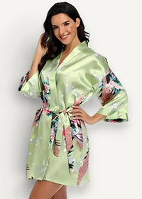 Short satin robe in shimmering light green satin with pink white and dark green floral pattern