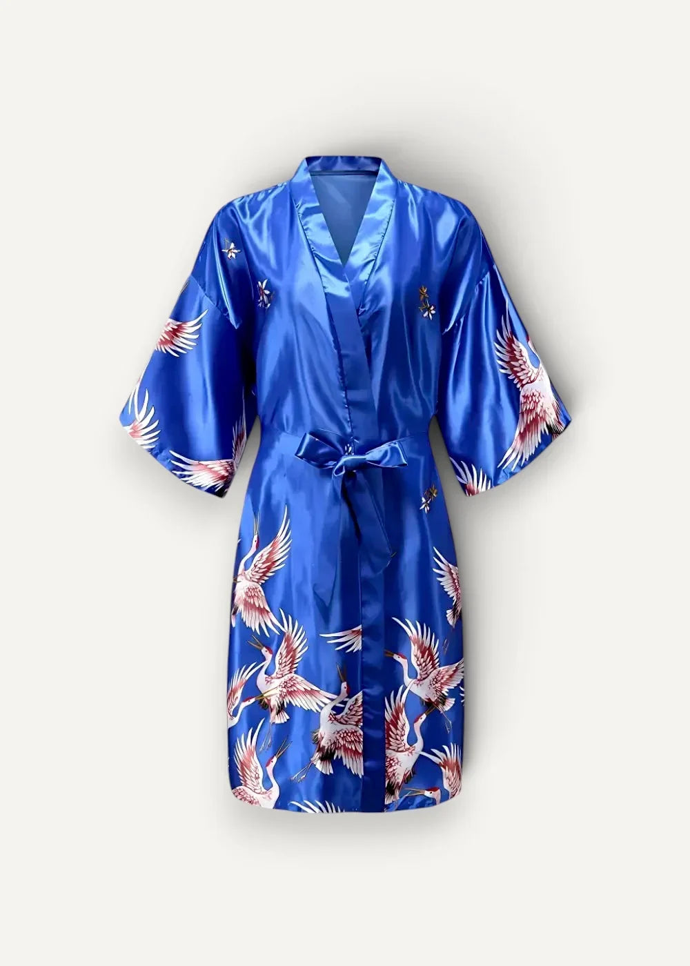 Short silk robe in royal blue satin with white and pink crane pattern, short sleeves, and a matching tied belt