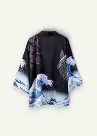 Silk kimono jacket in black with vibrant blue and white wave design featuring fish and dragon inspired by hokusai