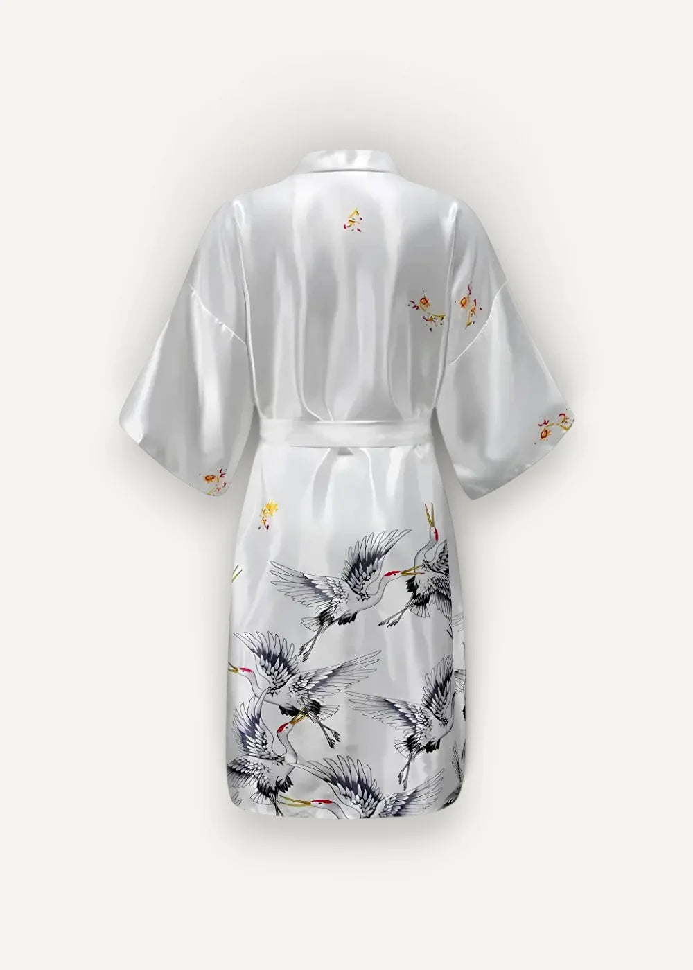 White satin silk kimono robe women’s featuring elegant black and gold crane illustrations on the fabric