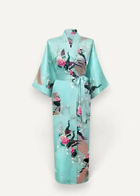 Silk robe women with light turquoise silk featuring vibrant peacock and pink floral pattern tied with matching belt