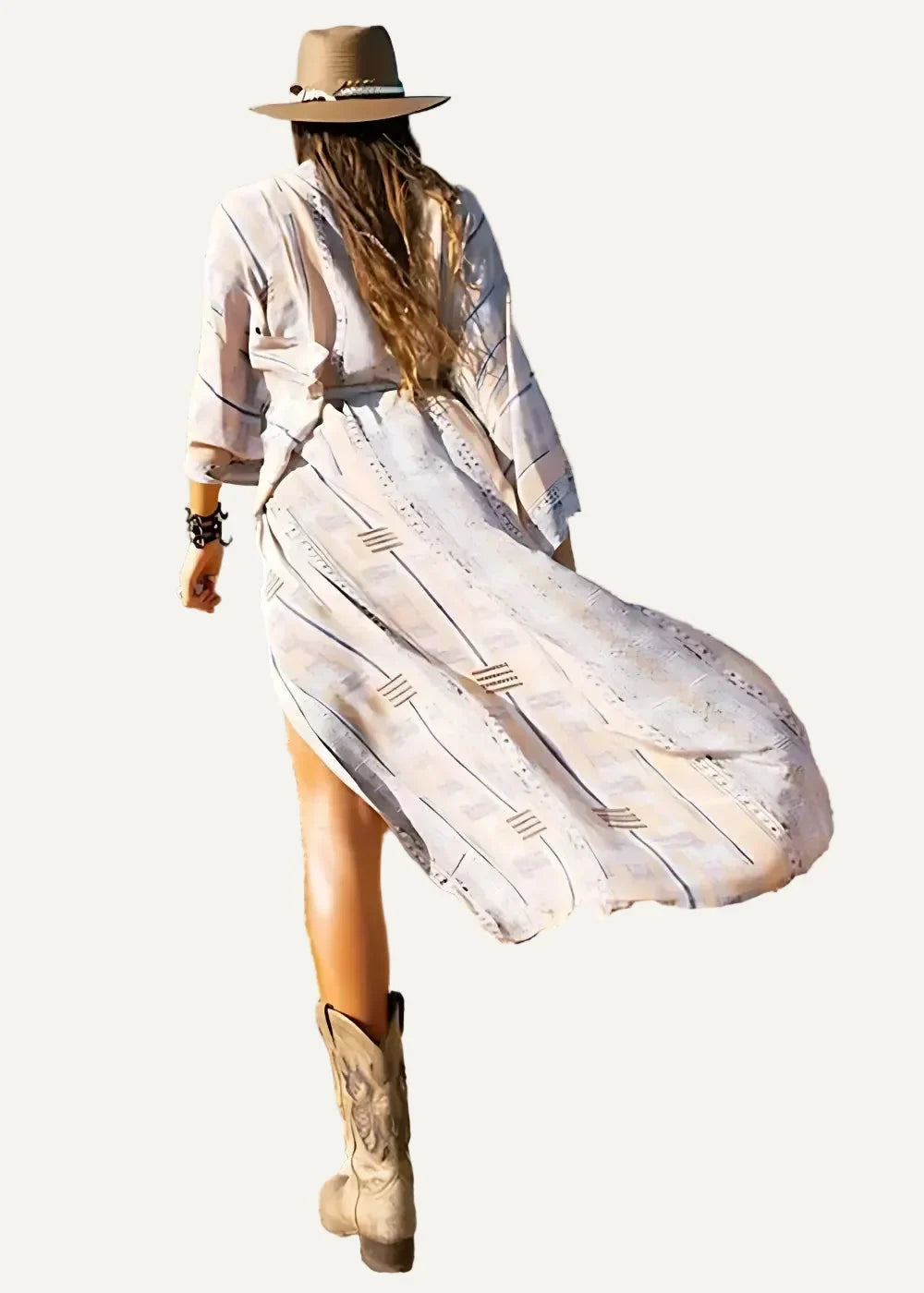 A flowing off-white maxi dress with black geometric patterns and a relaxed bohemian cut called striped kimono
