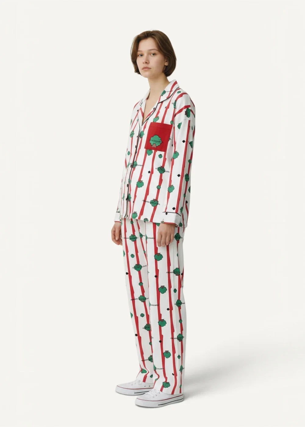 Striped kimono pajamas in white with red vertical stripes green circular motifs and a red chest patch