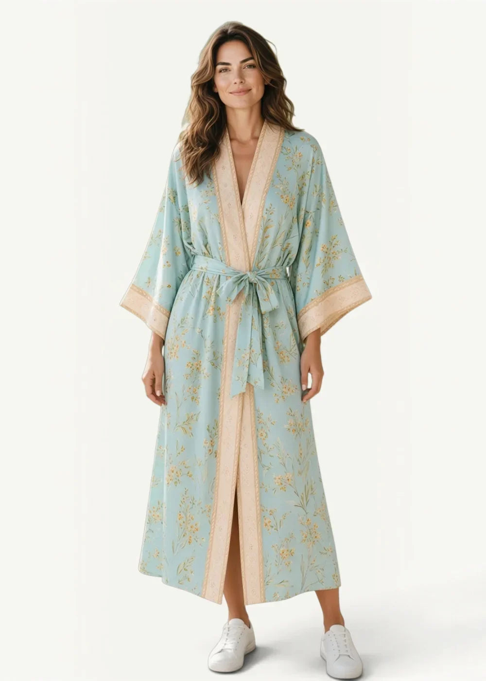 A light blue summer beach kimono floral robe with beige trim and gold botanical patterns with matching belt