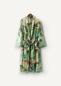 A light green silk summer kimono cover up with vibrant rose and bamboo floral pattern tied at the waist
