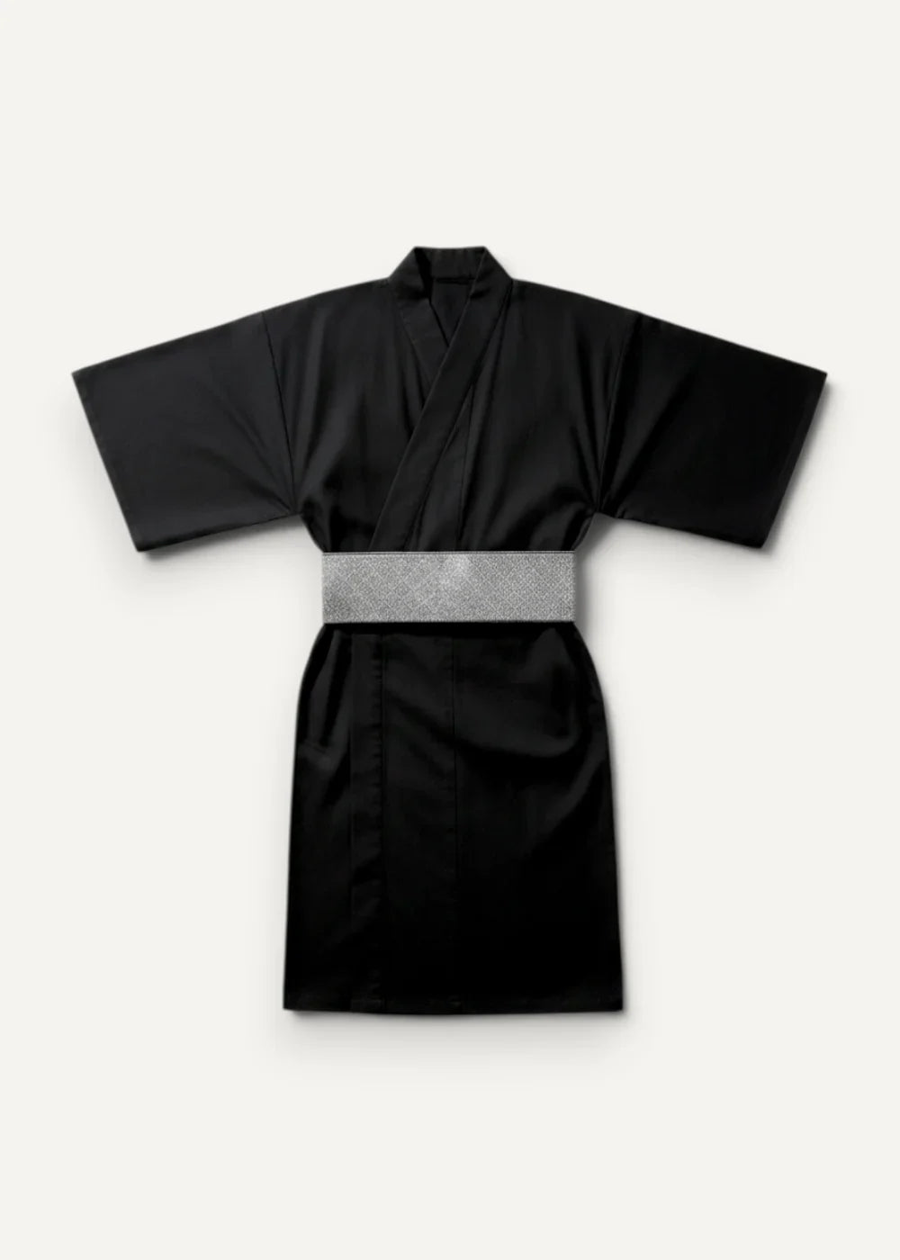 Traditional black kimono in satin fabric with a shimmering silver belt for elegant cultural wear