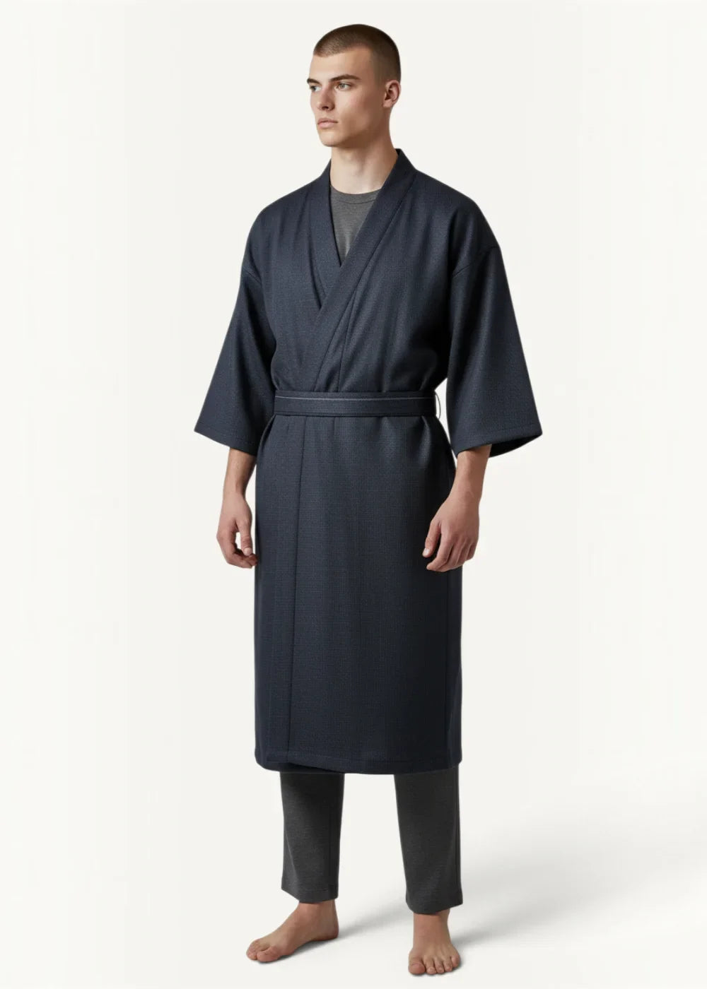 A dark navy blue traditional Japanese kimono robe with long sleeves, belted waist, and wrap design