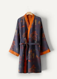 Traditional Japanese kimono robe male in dark blue with orange lining and red brown floral pattern trim