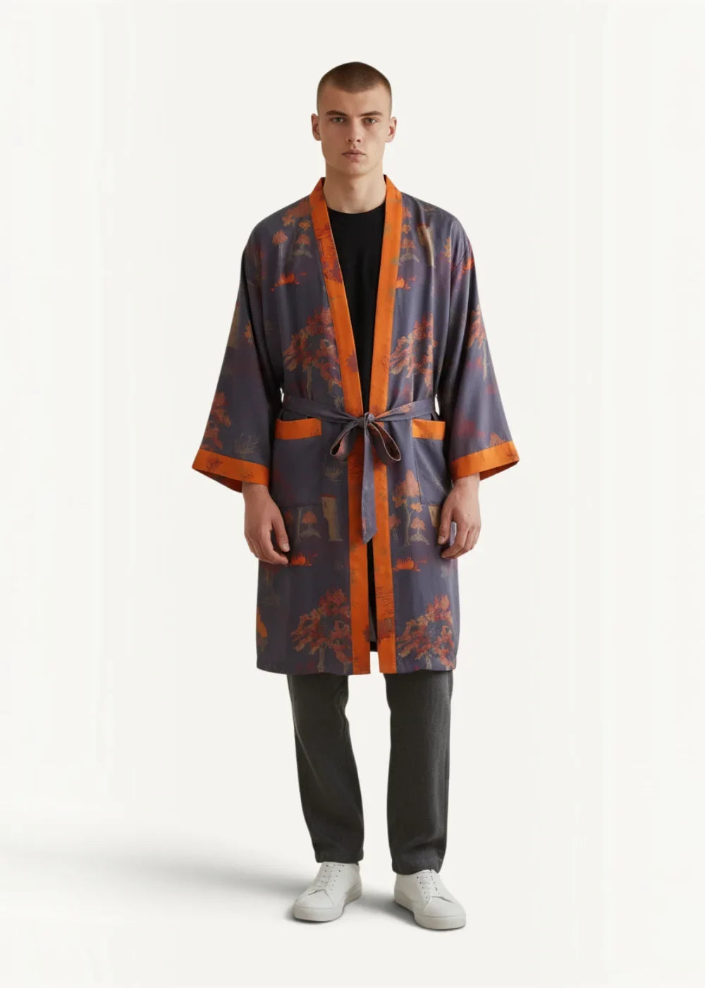 Traditional Japanese kimono robe male in dark purple with orange and red floral pattern and orange trim details
