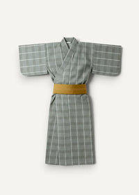 Traditional Japanese male kimono gray and white plaid fabric with mustard yellow obi belt front view