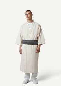 Traditional kimono cream-colored loose-fitting robe with wide dark gray striped belt for comfortable wear