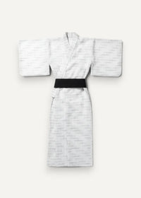 Traditional yukata white kimono with subtle geometric pattern and contrasting black obi belt for casual wear
