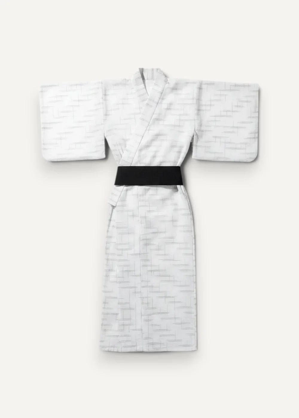 Traditional yukata white kimono with subtle geometric pattern and contrasting black obi belt for casual wear