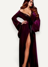 A luxurious deep purple velvet kimono robe with black lace trim and matching belt for elegant loungewear