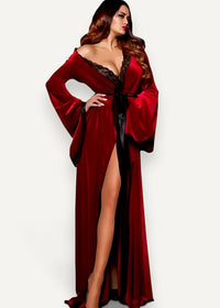 A luxurious deep red velvet kimono robe with black lace trim and a matching satin belt