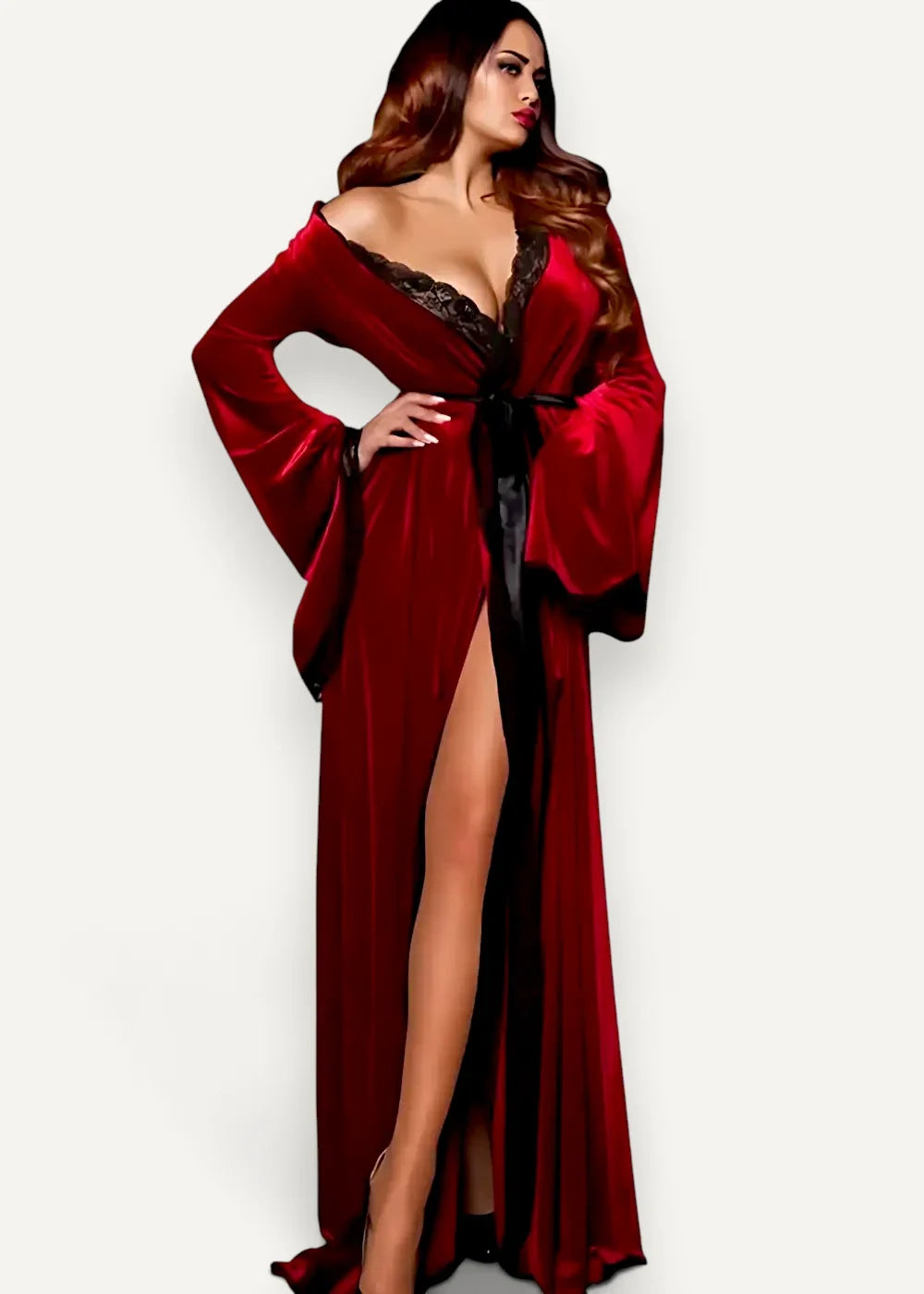 A luxurious deep red velvet kimono robe with black lace trim and a matching satin belt