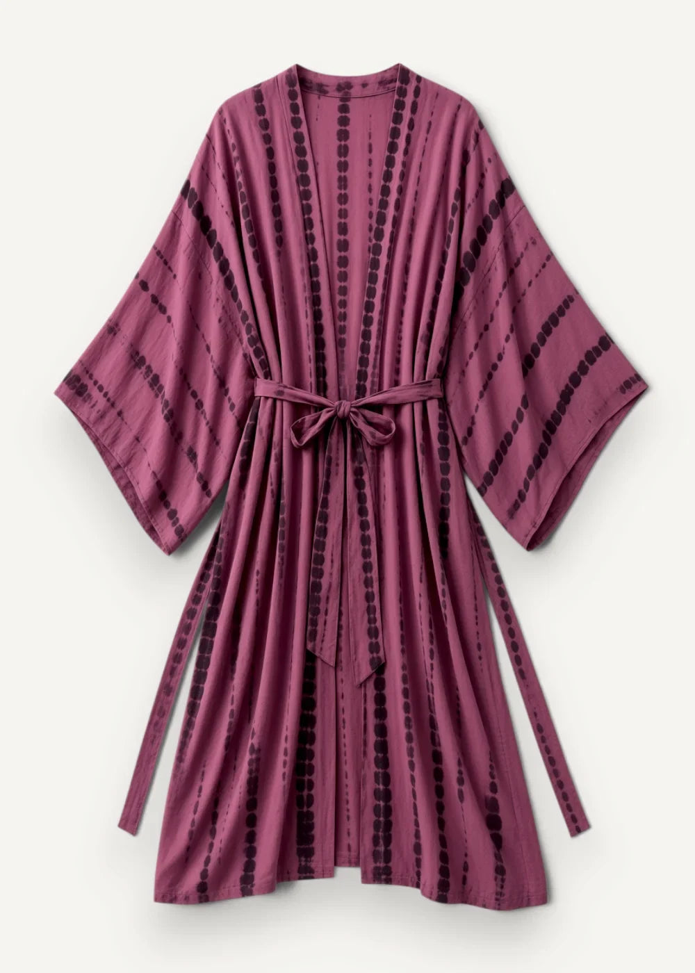 Velvet kimono in soft mauve tie-dye with black dotted stripes and a matching belt tied at the waist