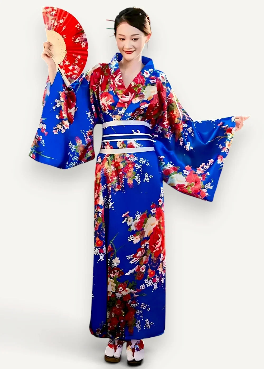Vintage Japanese kimono featuring vibrant blue silk fabric with red and white floral blossoms for elegant wear