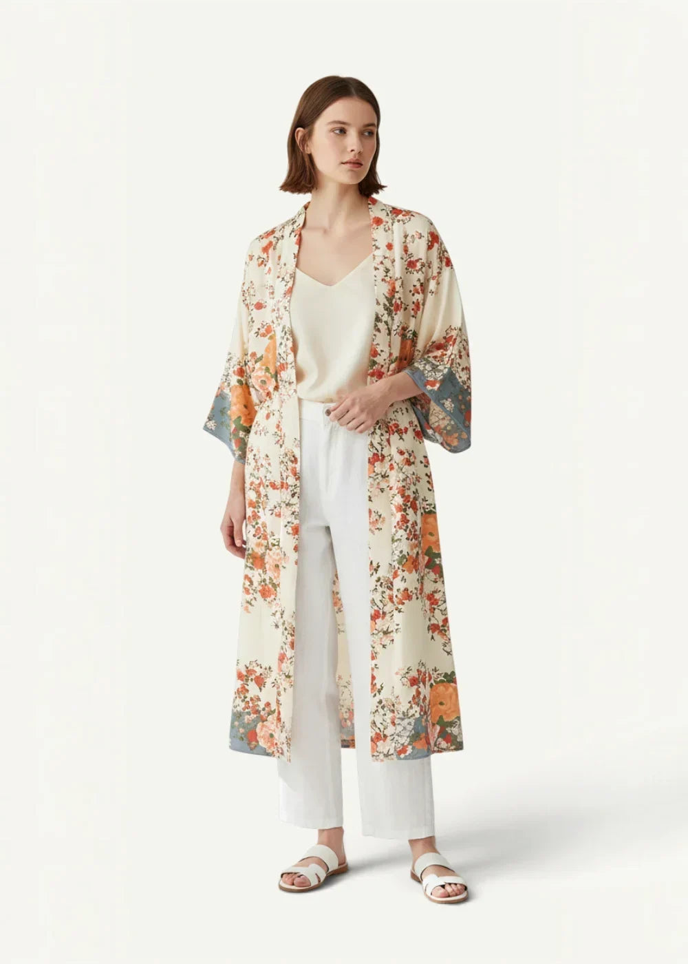 White beach kimono long flowing beige floral design with vibrant orange red blossoms and green leaves