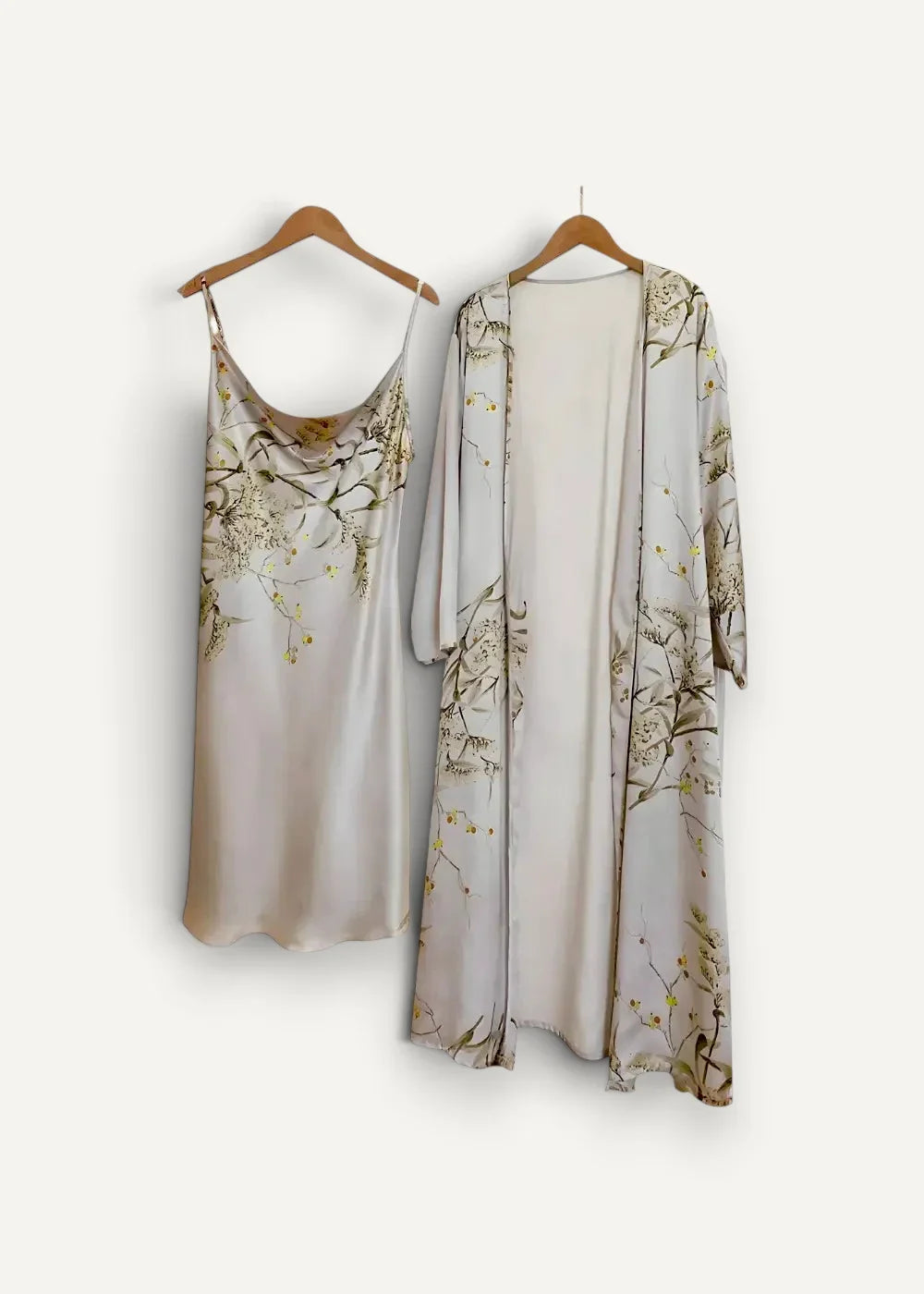 White floral nightgown and robe set featuring a delicate light beige silk dress with elegant gold and green floral patterns