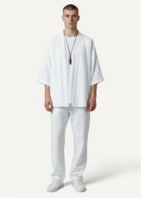 White haori oversized kimono style top with relaxed fit short sleeves in minimalist design and lightweight fabric