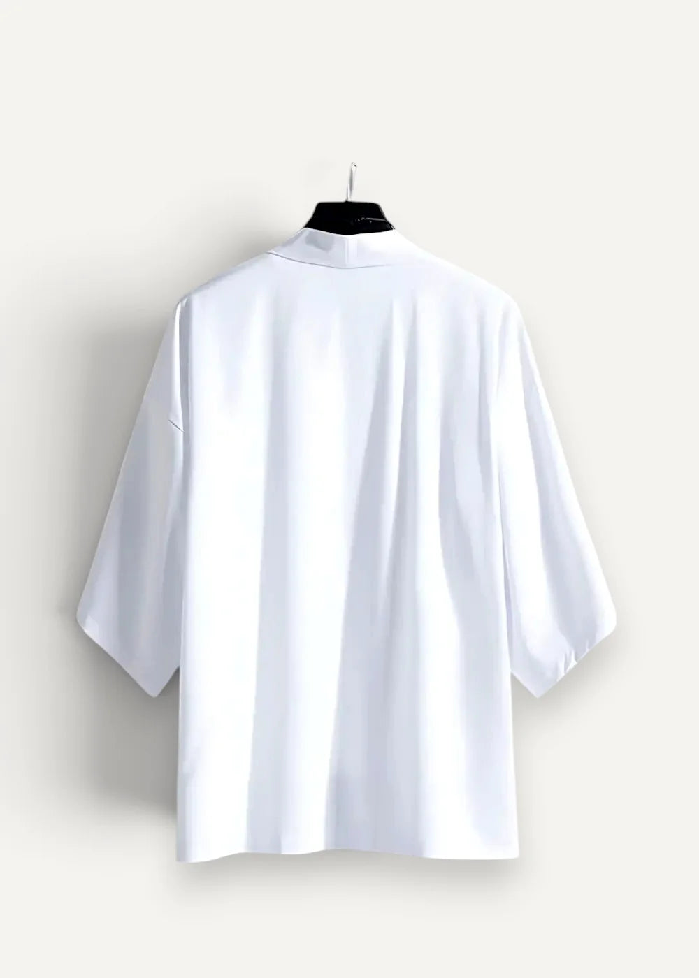 White haori oversized short-sleeved blouse with relaxed fit and subtle vertical pleats for casual wear