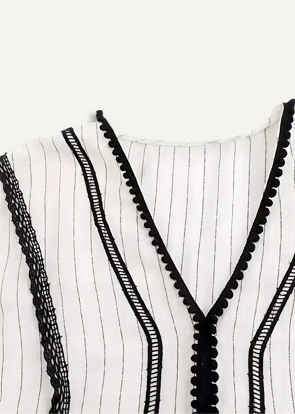 White kimono dress with black vertical stripes and decorative lace trim along the neckline