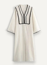 White kimono dress cream with vertical stripes and black embroidered detailing on neckline and sleeve edges