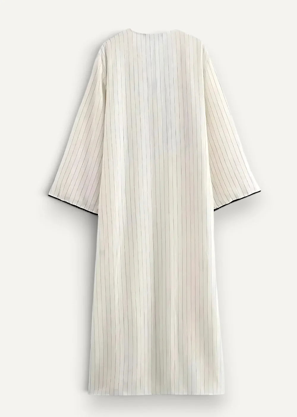 White kimono dress with flowing off-white fabric, delicate vertical stripes, and black-trimmed sleeves