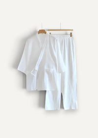 White kimono pajamas in cotton with a loose fitting top and wide leg pants