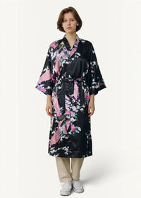 Women’s black satin robe with vibrant pink white and green floral pattern ideal for lounging and relaxing