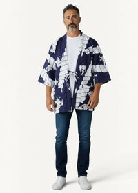 Women’s haori kimono-style jacket in navy blue and white with traditional Japanese patterns shown from the back side