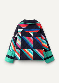 Women’s kimono jacket with vibrant quilted multicolored geometric triangles and stripes on black background with teal trim