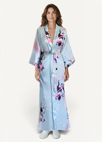 Women’s long silk robe in light blue satin with peacock and pink floral pattern v neckline and belted waist