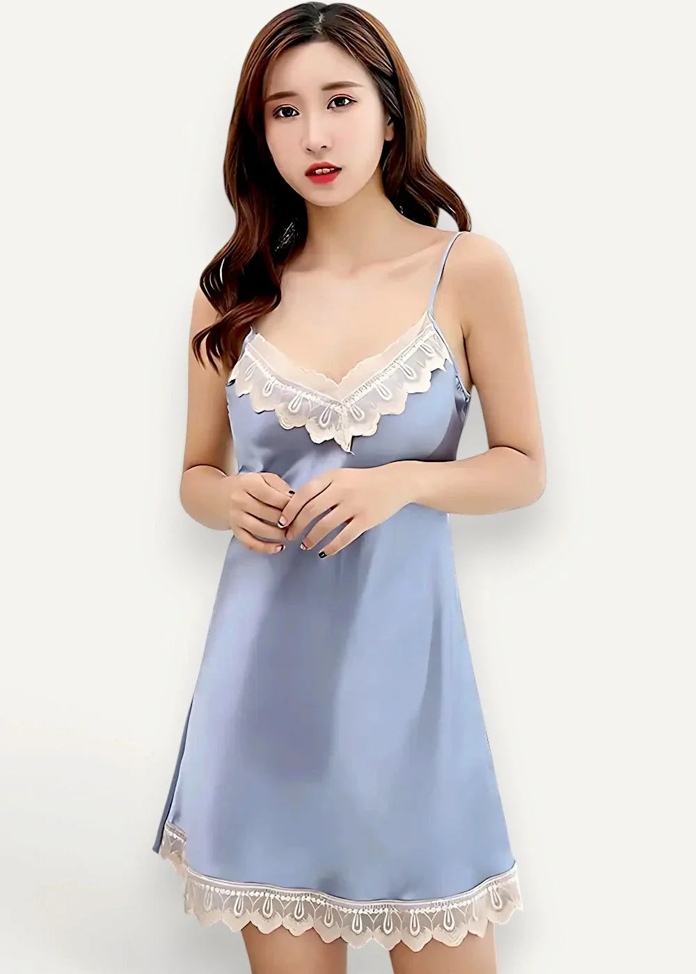 A delicate light blue satin nightgown with lace trim at neckline and hem in women’s satin nightgown and robe set