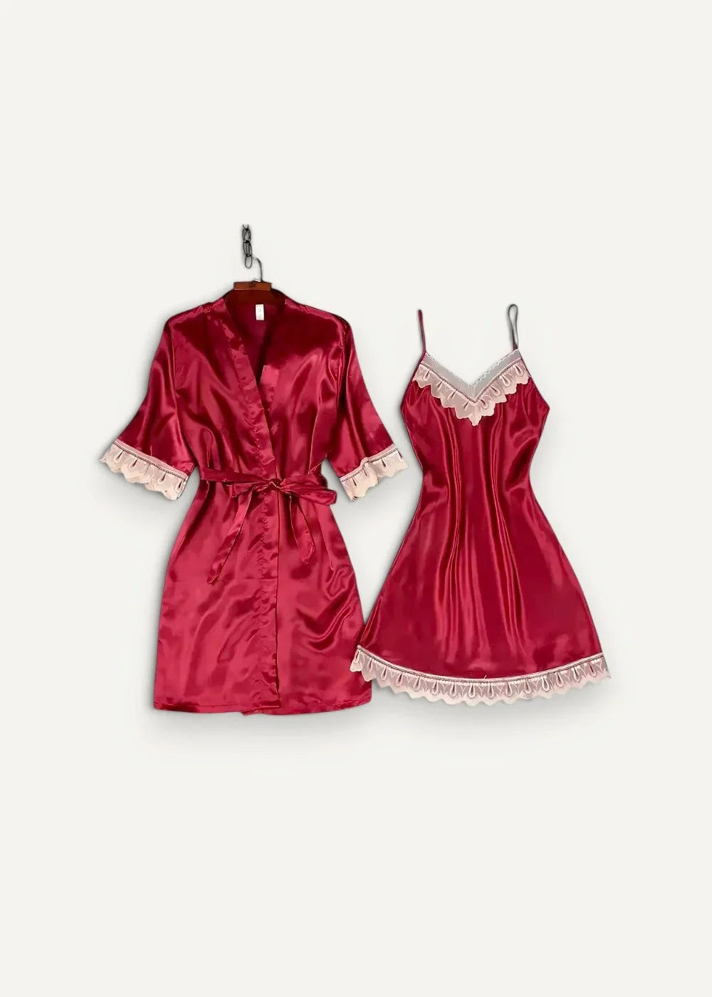 Women’s satin nightgown and robe set in luxurious red satin with pink lace trim on cuffs waist and slip dress neckline and hem