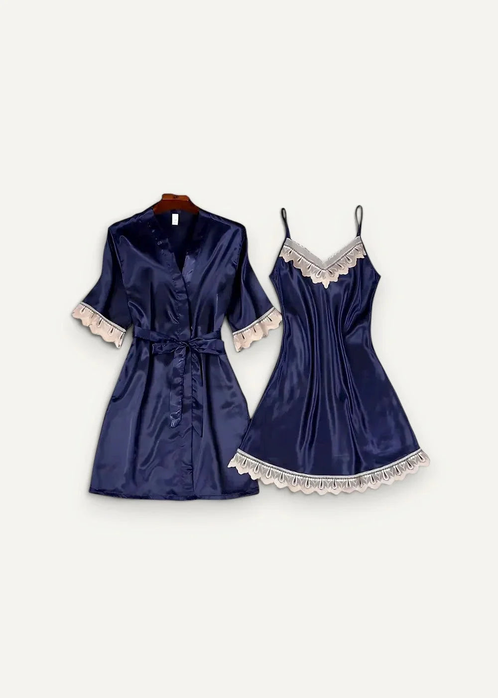 Navy blue satin pajama set with delicate lace trim on collar cuffs and hem in women’s satin nightgown and robe set