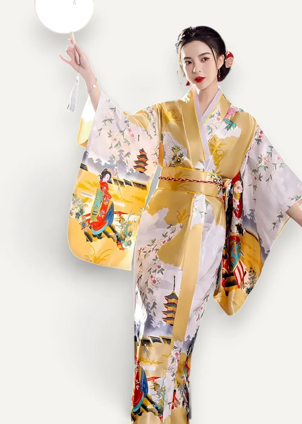 A woman wearing a vibrant yellow satin kimono robe with white traditional Japanese pagoda and floral illustrations