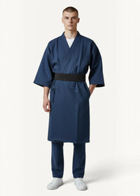 Navy blue yukata kimono robe with three quarter sleeves black belt and front pockets for comfortable wear