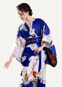 A vibrant blue and white silk yukata women kimono with intricate floral patterns and traditional pagoda embroidery